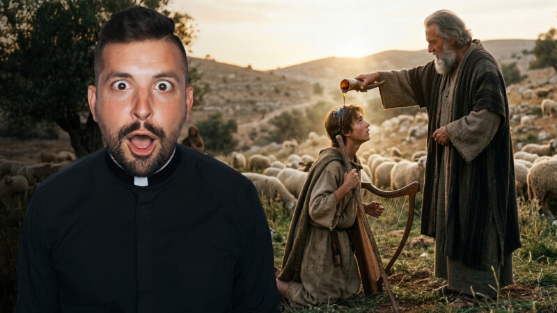 Fr. Tim, in a black clerical collar, with a dramatic, wide-eyed, and open-mouthed expression of shock. He is superimposed over a detailed biblical landscape where the prophet Samuel is anointing young King David from a horn. David, holding a harp and leaning against a staff, is surrounded by a flock of sheep. This thumbnail is produced for Reel Homilies.
