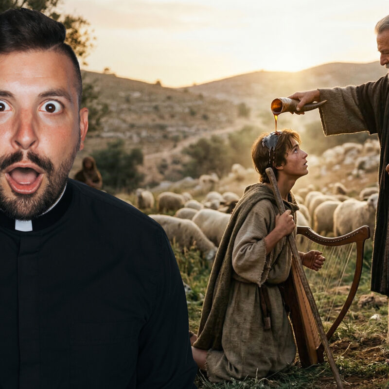 Fr. Tim, in a black clerical collar, with a dramatic, wide-eyed, and open-mouthed expression of shock. He is superimposed over a detailed biblical landscape where the prophet Samuel is anointing young King David from a horn. David, holding a harp and leaning against a staff, is surrounded by a flock of sheep. This thumbnail is produced for Reel Homilies.
